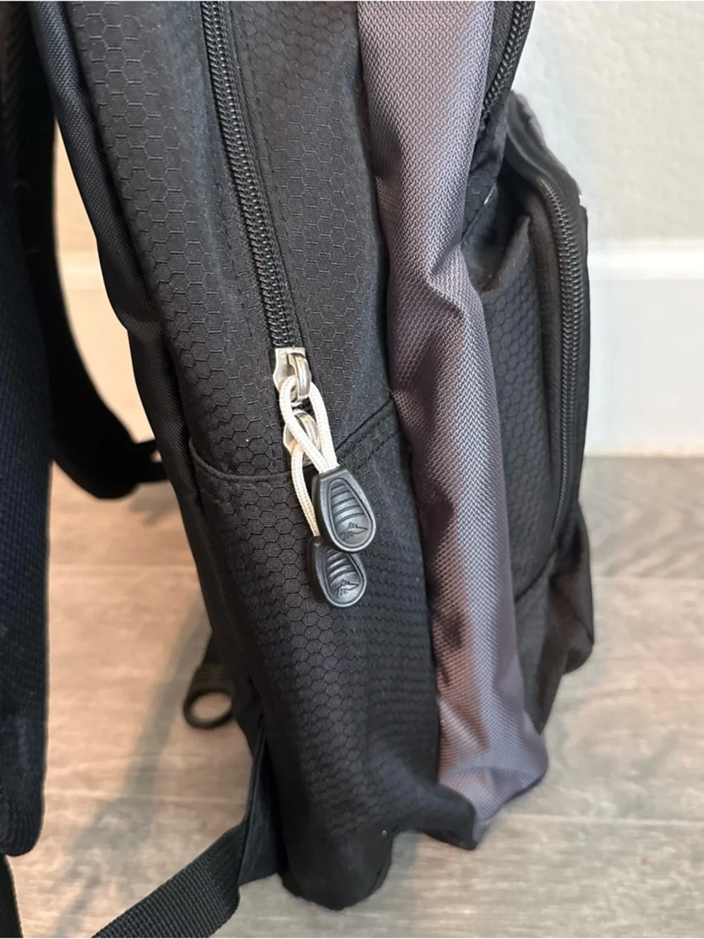 High Sierra Black and Gray Backpack with Blue and Orange Logo